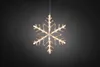 A lit snowflake decoration hangs against a dark background. Produktbild-Vorschau