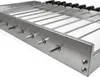 A close-up, angled view of a stainless steel grill attachment with multiple skewers. Podgląd zdjęcia produktu