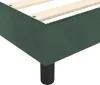 Close-up of the corner of a dark green upholstered bed frame with wooden slats and a black leg. Produktbild-Vorschau