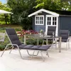 An outdoor patio scene with garden furniture and a small shed. Produktbild-Vorschau