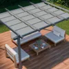 An outdoor living space with a pergola, seating, and a coffee table. Produktbild-Vorschau