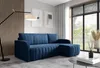 A navy blue sectional sofa is shown in a modern living room setting with a floor lamp and artwork on the wall.
