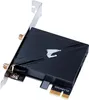 A close-up, angled studio shot of a black Gigabyte Aorus Wi-Fi 7 network card against a white background. Voir les images du produit