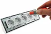 A hand is using a screwdriver to attach a white power strip with five outlets to a metal frame. Produktbild-Vorschau