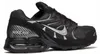 A black Nike Air Max Torch 4 sneaker is shown from the side against a white background. Voir les images du produit