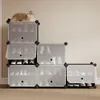 A cat is sitting on top of a modular shoe rack unit. Podgląd zdjęcia produktu
