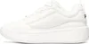 A white Fila sneaker is shown from the side against a white background. Podgląd zdjęcia produktu