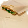 A sandwich is shown inside a beige reusable toast bag, with other bags visible underneath. Produktbild-Vorschau