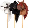 Three hobby horses on sticks, each with a different colored head and mane, are displayed against a white background. Podgląd zdjęcia produktu