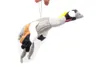 A plush toy of a crane is hanging from a string against a white background. Produktbild-Vorschau