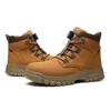 A pair of brown work boots on a white background. Produktbild-Vorschau