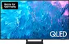 A Samsung QLED television displaying a colorful abstract image. Voir les images du produit