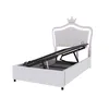 A white upholstered bed frame with a crown-shaped headboard featuring LED lighting, shown with its hydraulic lift mechanism exposed. Produktbild-Vorschau