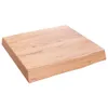 A square wooden tabletop with a natural wood grain texture, shown from a slightly elevated angle. Náhled obrázku produktu