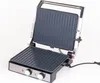 A close-up view of an open electric grill against a white background. Produktbild-Vorschau