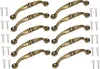 A set of ten antique-style drawer pulls and their accompanying screws, arranged in two columns on a white background. Náhled obrázku produktu