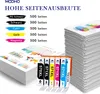A stack of papers with charts and graphs next to a set of ink cartridges and a large stack of papers. Produktbild-Vorschau