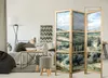 A living room scene with a sofa, floor lamp, and a decorative screen. Produktbild-Vorschau