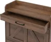 A close-up view of an open drawer on a wooden cabinet. Podgląd zdjęcia produktu
