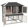 A wooden animal hutch with multiple doors and levels, shown from a front-diagonal angle. Voir les images du produit