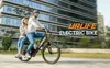 A couple riding an electric bike in front of a modern building. Produktbild-Vorschau