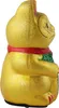 A side view of a golden Maneki-neko cat figurine. Produktbild-Vorschau