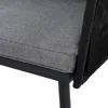 A close-up view of a chair cushion and woven back. Produktbild-Vorschau