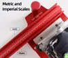 A close-up view of a red Festool guide rail with metric and imperial scales, showing a portion of the Festool DF500/700 plunge saw attached. Podgląd zdjęcia produktu