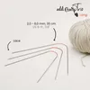 Knitting needles and yarn are displayed on a white background. Produktbild-Vorschau