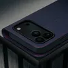 Close-up of a dark blue leather phone case with red stitching, showing the camera cutout. Anteprima dell’immagine prodotto