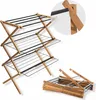 A wooden drying rack is shown in its open and folded states against a white background. Podgląd zdjęcia produktu