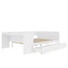 A white bed frame with drawers and a desk component, shown from the side with one drawer pulled out. Produktbild-Vorschau