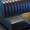 A close-up view of a black diner-style booth seat with blue LED lighting along the edge. Anteprima dell’immagine prodotto