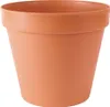 A terracotta colored plant pot on a white background. Náhľad obrázku produktu