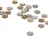 A collection of small, snowflake-shaped confetti pieces in gold, silver, and natural wood colors scattered on a white background. Produktbild-Vorschau