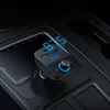 A car's center console with a black FM transmitter plugged into the cigarette lighter socket. Anteprima dell’immagine prodotto