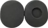 Two black foam ear pads for headphones are shown side-by-side on a white background. One ear pad is solid, while the other has a circular cutout in the center. Voir les images du produit