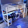 A loft bed with a desk and storage underneath, illuminated by blue LED lights. Podgląd zdjęcia produktu