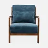 A blue armchair with a wooden frame against a light gray background. Anteprima dell’immagine prodotto