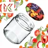 A clear glass jar is shown surrounded by various fruits and vegetables, with a logo in the upper left corner. Produktbild-Vorschau