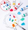 A collection of watercolor paint tubes, a palette, and brushes are arranged on a white surface, with dabs of paint scattered around. Náhľad obrázku produktu