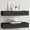 Two black floating shelves mounted on a white wall, decorated with books, a plant, and decorative items. Produktbild-Vorschau