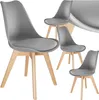 A set of four gray dining chairs with wooden legs, arranged in a studio setting against a white background. Náhled obrázku produktu