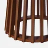 A close-up view of the base of a wooden table with vertical slats. Produktbild-Vorschau