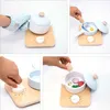 A collage of four images showing a child's toy cooking set being used. Podgląd zdjęcia produktu