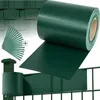 A roll of green privacy screen material is shown unrolling over a fence, with a pile of green clips in the foreground. Náhled obrázku produktu