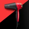 A professional studio shot of a hairdryer against a split red and black background. Náhled obrázku produktu
