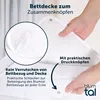A close-up view of a white duvet with snaps and loops, highlighting its features for attaching to a duvet cover. Produktbild-Vorschau
