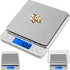 A digital scale with two gold rings on it, with two smaller scales shown in the corners. Produktbild-Vorschau