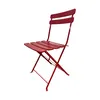 A red folding chair is shown against a white background. Náhľad obrázku produktu
